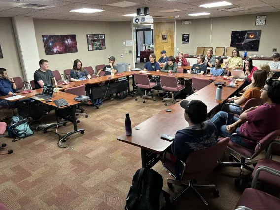 Group of students meeting in a classroom